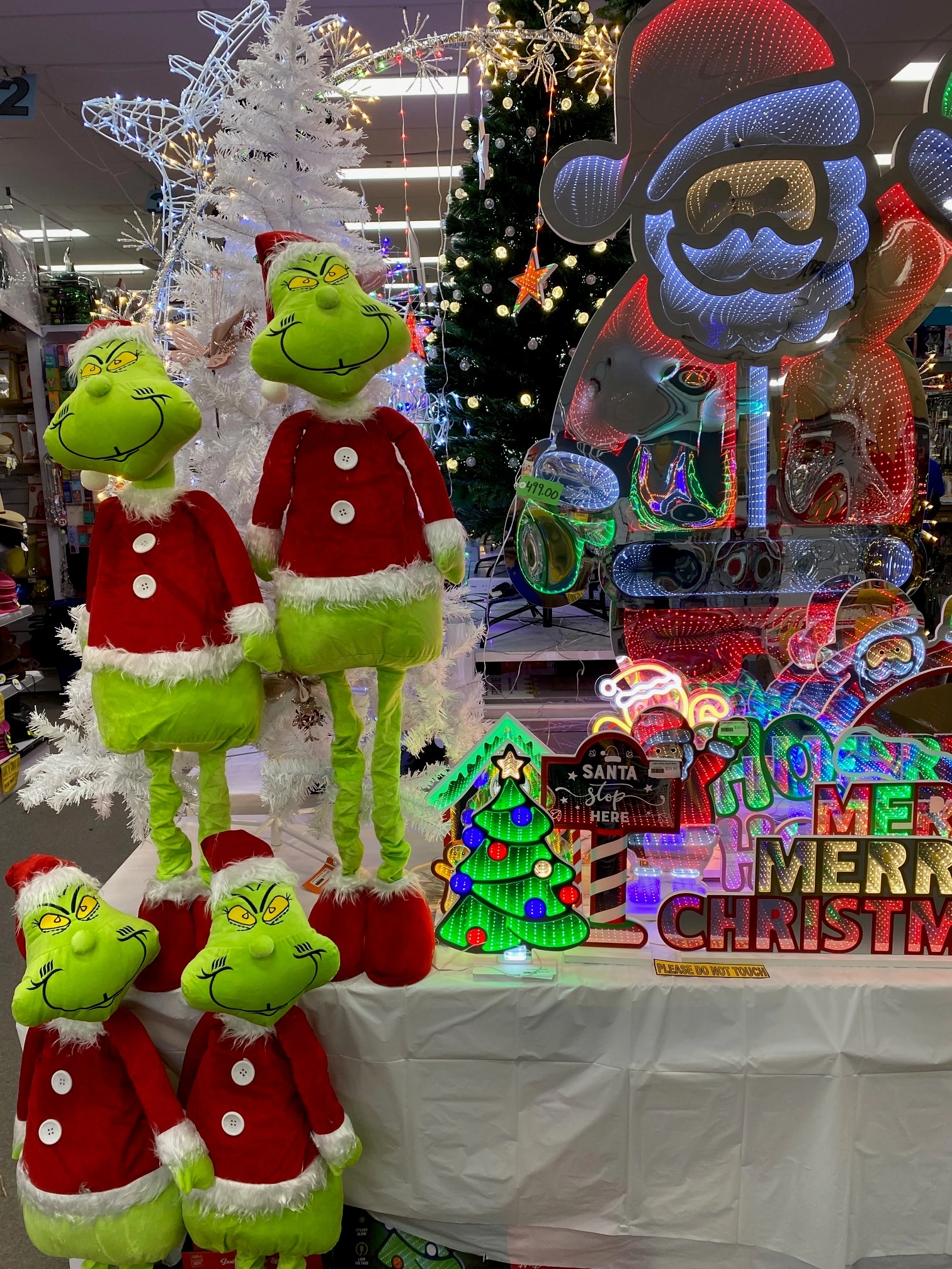 Christmas-decorations-aisle-in-Coffs-Harbour-with-trees-lights-and-festive-displays
